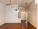 Spacious living area with hardwood floors, bright lighting, and a seamless flow at 629 Bright Lights Ave, North Las Vegas, NV 89031