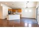 Bright and airy living space flowing into the kitchen, featuring ample counter space and modern appliances at 629 Bright Lights Ave, North Las Vegas, NV 89031