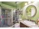 Bathroom featuring a tiled shower, modern vanity, and updated fixtures at 6741 Bonillo Dr, Las Vegas, NV 89103
