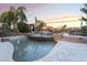 Backyard pool with waterfall, slide and rock features with spa at 7600 Pleasant Colony Ct, Las Vegas, NV 89131