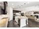 Open-concept kitchen with a center island and stainless steel appliances at 7763 Brisk Ocean Ave, Las Vegas, NV 89178