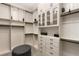 Stay organized in this spacious walk-in closet with custom shelving and ample storage, next to a full bath at 7763 Brisk Ocean Ave, Las Vegas, NV 89178