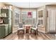 Breakfast nook with granite counters, light-filled windows, and pendant lighting at 7837 Silver Plateau Ave, Las Vegas, NV 89128