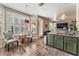 This breakfast nook features plantation shutters and granite countertops at 7837 Silver Plateau Ave, Las Vegas, NV 89128