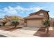 A well-maintained home shows its front exterior with clean driveway, landscaping and inviting curb appeal on a sunny day at 7837 Silver Plateau Ave, Las Vegas, NV 89128