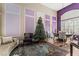 Living room with lots of light has vaulted ceilings and a beautiful fireplace at 7837 Silver Plateau Ave, Las Vegas, NV 89128