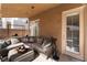 Inviting covered patio with comfortable seating, perfect for outdoor relaxation and entertaining at 7837 Silver Plateau Ave, Las Vegas, NV 89128