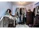 Walk-in closet with shelving, hanging racks, and storage space at 7837 Silver Plateau Ave, Las Vegas, NV 89128