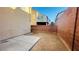 Small backyard offering privacy with block wall at 7985 Flower Seeds St, Las Vegas, NV 89139