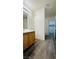 Bathroom featuring shower-tub combo and single vanity at 7985 Flower Seeds St, Las Vegas, NV 89139