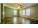Large bedroom with ceiling fan and natural light at 7985 Flower Seeds St, Las Vegas, NV 89139