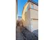 Side view of home showing stucco siding and limited backyard space at 7985 Flower Seeds St, Las Vegas, NV 89139