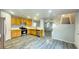 The bright kitchen overlooks the living area at 7985 Flower Seeds St, Las Vegas, NV 89139