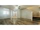 A spacious living room provides seamless access to the staircase at 7985 Flower Seeds St, Las Vegas, NV 89139