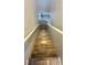 View of wooden stairs leading down to the next level at 7985 Flower Seeds St, Las Vegas, NV 89139
