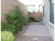 The backyard offers a tranquil retreat with patio and landscaping, perfect for relaxing and entertaining outdoors at 8957 Rufina St, Las Vegas, NV 89148