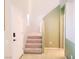 Bright entryway featuring tile flooring, a stairway to the second level, and neutral decor at 8957 Rufina St, Las Vegas, NV 89148