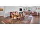 The formal dining area features a stylish table set and is great for Gathering meals at 9076 Bridal Creek Ave, Las Vegas, NV 89178