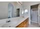 Primary bathroom featuring a double sink vanity with tile flooring and a walk-in shower at 9378 Spellman Ct, Las Vegas, NV 89123