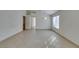 Bright living room with tile flooring, neutral walls, and ample natural light at 9378 Spellman Ct, Las Vegas, NV 89123