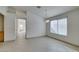 Bright living room with tile flooring, neutral walls, and ample natural light at 9378 Spellman Ct, Las Vegas, NV 89123