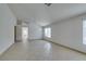 Bright living room with tile flooring, neutral walls, and ample natural light at 9378 Spellman Ct, Las Vegas, NV 89123