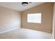 Bedroom with a window, vaulted ceiling, and wood floors at 9424 Fox Forest Ave, Las Vegas, NV 89129