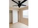 Bedroom featuring a window, closet with sliding doors, and modern ceiling fan at 9424 Fox Forest Ave, Las Vegas, NV 89129