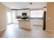 Modern kitchen featuring white cabinets, stainless steel appliances, and a granite island at 9424 Fox Forest Ave, Las Vegas, NV 89129