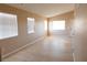 Bright and airy living room with vaulted ceiling, wood-look flooring and plenty of natural light at 9424 Fox Forest Ave, Las Vegas, NV 89129