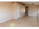 Bright living room with neutral paint, light wood-look floors and recessed lighting at 9424 Fox Forest Ave, Las Vegas, NV 89129