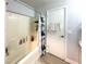 Bathroom featuring a shower/tub combination with white tiling at , Las Vegas, NV 89183