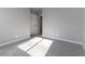 Neutral carpeted bedroom featuring a large window and closet, perfect for relaxation and storage at , Las Vegas, NV 89183