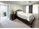 Cozy bedroom with a queen-sized bed, nightstand, and soft natural lighting from the window at , Las Vegas, NV 89183