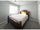 Bedroom with carpeted floor featuring a bed and window with natural light at , Las Vegas, NV 89183