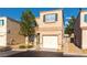 Inviting two-story home with a well-maintained yard and single-car garage at , Las Vegas, NV 89183