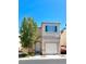 Charming two-story home featuring a well-maintained front yard and attached one car garage at , Las Vegas, NV 89183