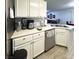 Bright kitchen with modern appliances, white cabinetry, and plenty of countertop space at , Las Vegas, NV 89183