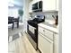 Modern kitchen with stainless steel oven and stovetop, lots of counter space, and modern cabinets at , Las Vegas, NV 89183
