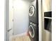 Efficient laundry area featuring stacked washer and dryer, maximizing space in a modern home at , Las Vegas, NV 89183