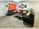 Spacious living room with plush gray carpeting, modern furniture and minimalist decor at , Las Vegas, NV 89183