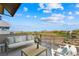 Relaxing balcony with comfortable seating offering stunning neighborhood views on a bright sunny day at 1091 E Sunset Rd, Henderson, NV 89011