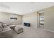 A neutral living room with large sectional sofa at 1091 E Sunset Rd, Henderson, NV 89011