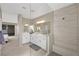 Modern main bathroom with double sinks, frameless glass shower, and stylish tile work at 1091 E Sunset Rd, Henderson, NV 89011