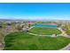 Aerial view of neighborhood park with pond and green space at 1091 E Sunset Rd, Henderson, NV 89011