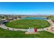 Aerial view of neighborhood park with pond and green space at 1091 E Sunset Rd, Henderson, NV 89011