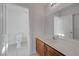 A full bathroom featuring tile flooring, white vanity top, and a bathtub with shower at 1163 Tumbling River Ave, Henderson, NV 89052