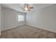 Neutral bedroom with carpet and a window at 1163 Tumbling River Ave, Henderson, NV 89052