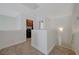 Upstairs hallway leading to laundry and bedrooms at 1163 Tumbling River Ave, Henderson, NV 89052