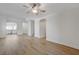 Bright living room showcasing an open floor plan with views to the kitchen at 1163 Tumbling River Ave, Henderson, NV 89052